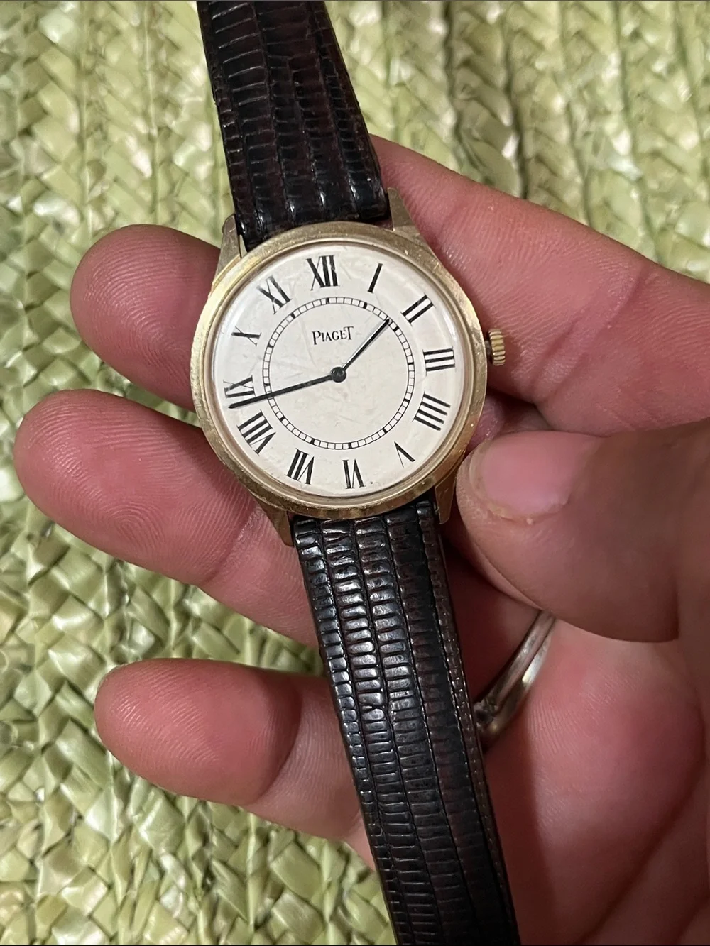 Piaget Silver Case Watch with Black Leather Strap and White Dial